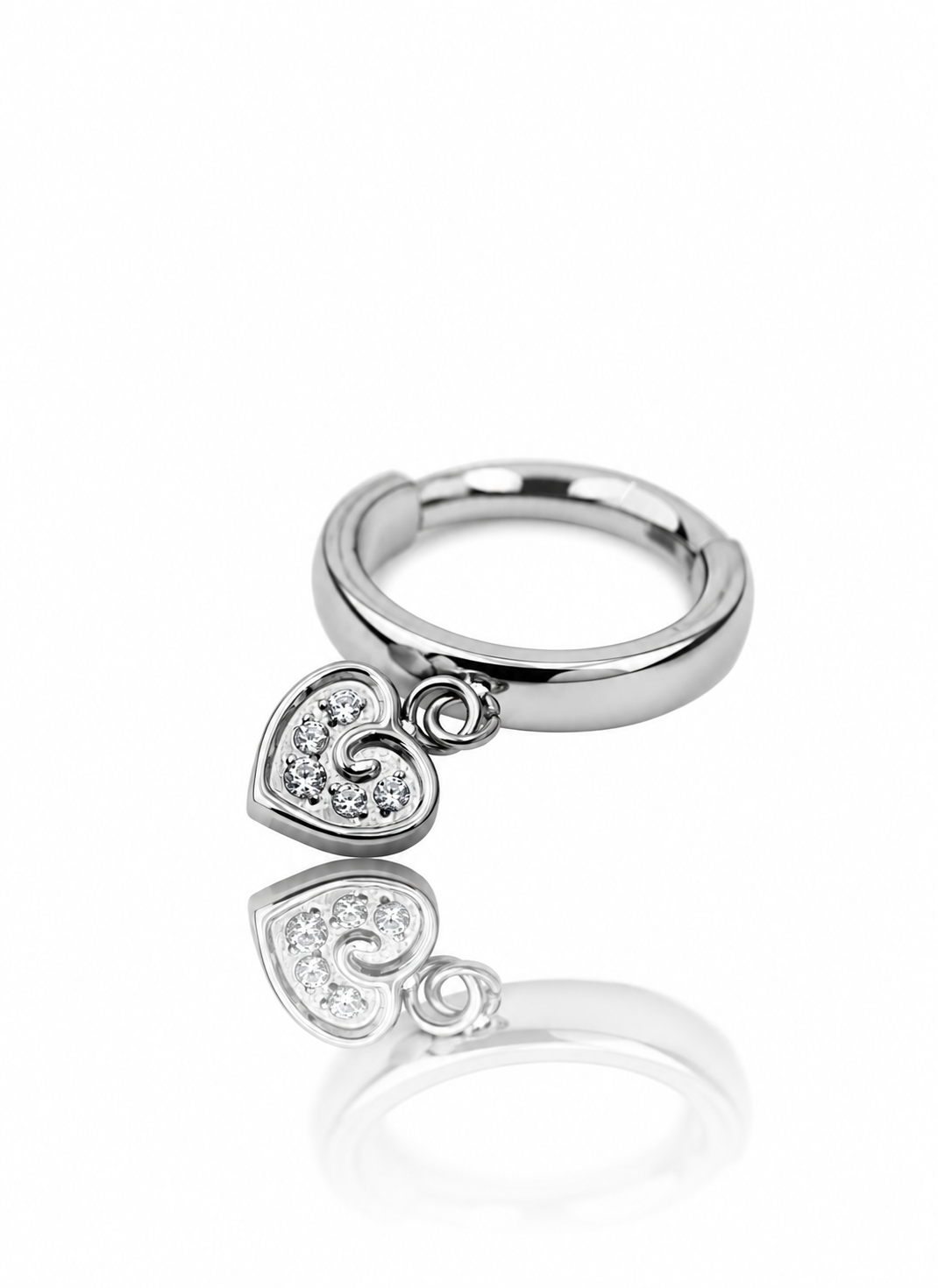 "Love on the edge" earring - Titanium clicker with a hanging heart with cubic zirconia