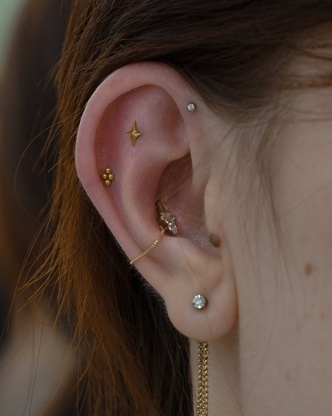 Kolczyk do ucha "4 is more" - anodyzowana tytanowa nakrętka