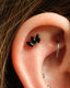"3 stone black" earring - anodized titanium labret in the shape of a triple teardrop with black onyx